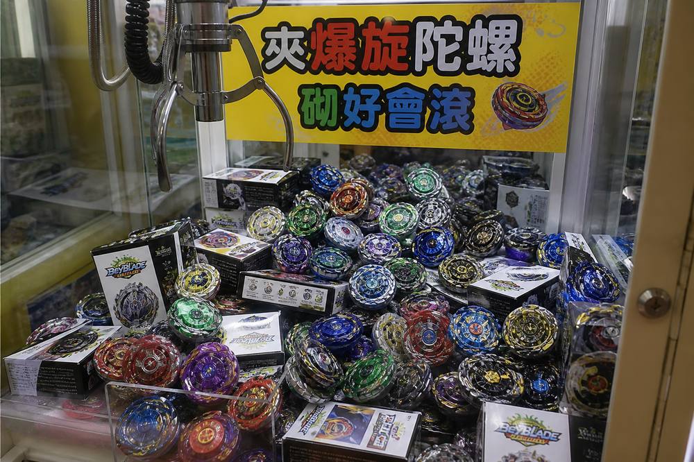 夾公仔機入面嘅爆旋陀螺